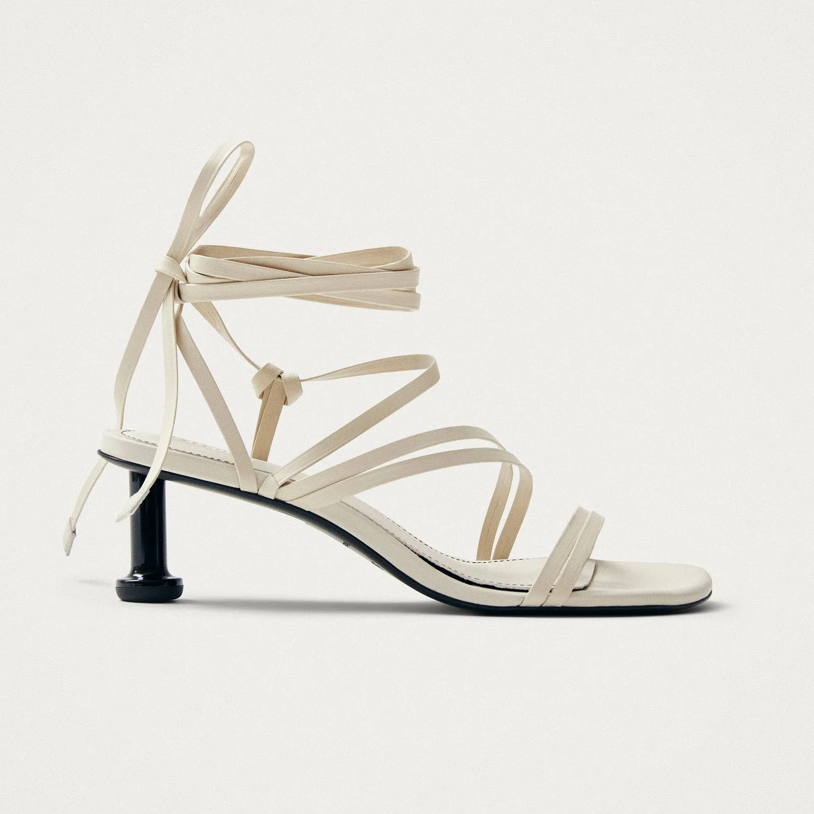 Curly Cream Leather Sandals
