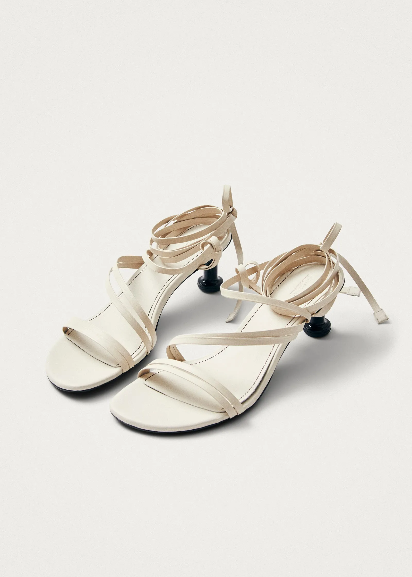 Curly Cream Leather Sandals